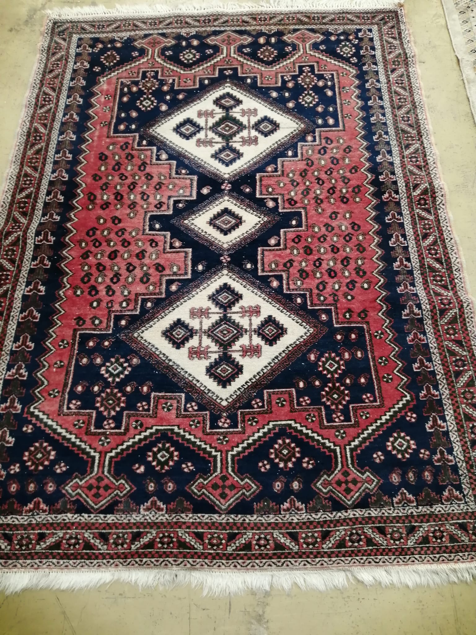 A Caucasian style blue and red ground rug, 180 x 130cm